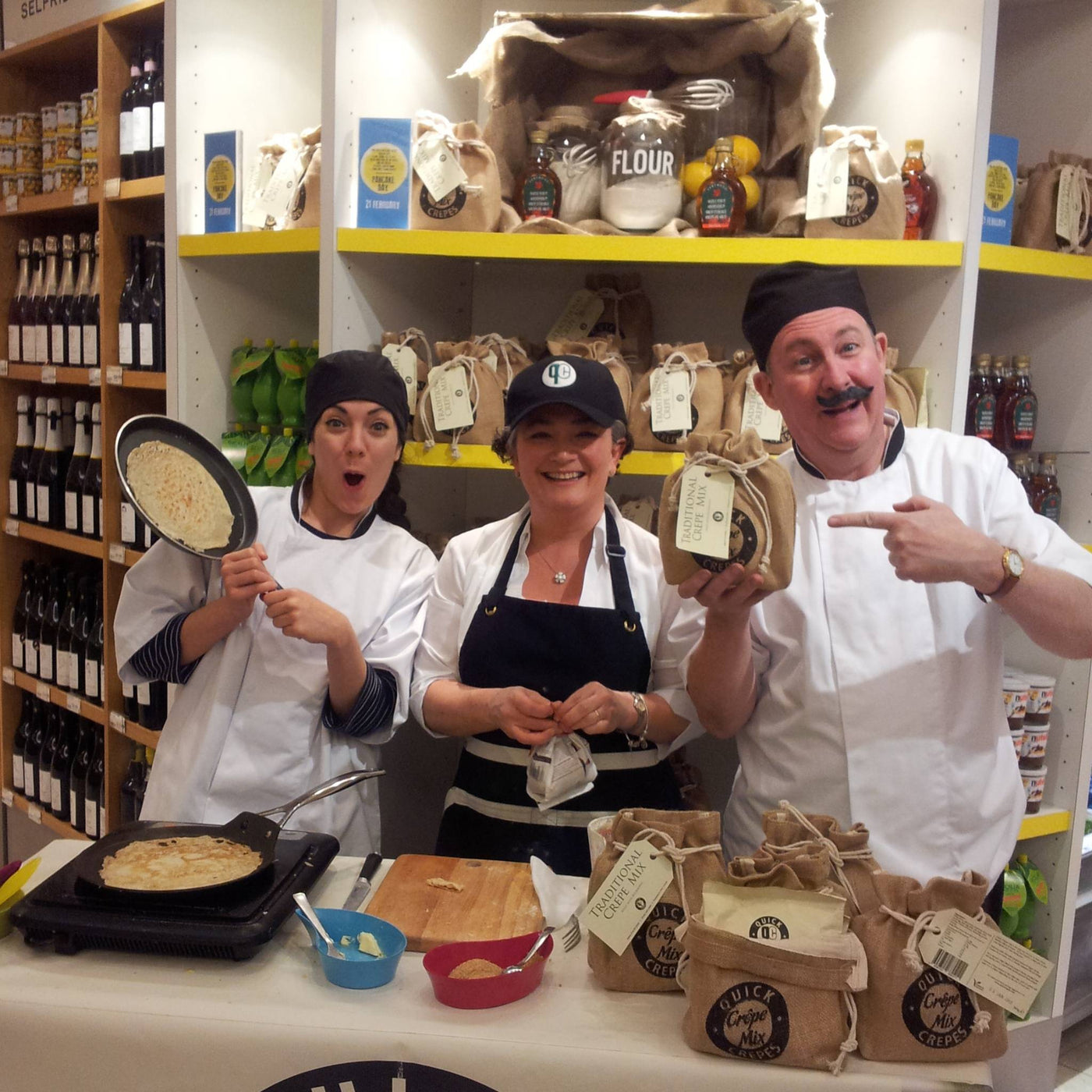 Stall in Selfridges promoting crepe mix with funny French character actors waving a frying pan
