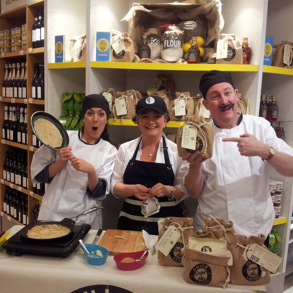 Stall in Selfridges promoting crepe mix with funny French character actors waving a frying pan
